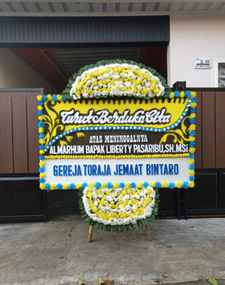 Papan Bunga Duka di Angsana